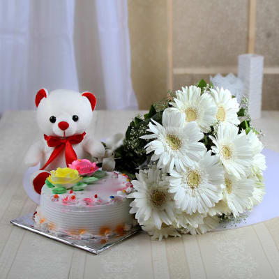 Bunch of 12 White Gerberas With 6 Inches Teddy & Half Kg Vanilla Cake