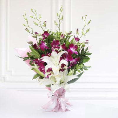 Bunch of 4 Purple Orchids & 2 Lilies with Black Forest Cake