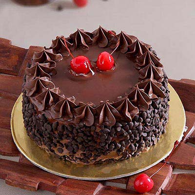 Chocolate Cake with Chocolate Chips & Cherry Toppings