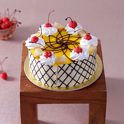 Pineapple Cake with Cherry & Cream Toppings