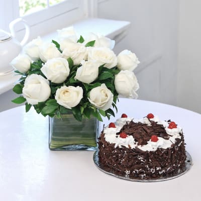 Vase Arrangement 15 White Roses with Black Forest Cake (Half Kg)
